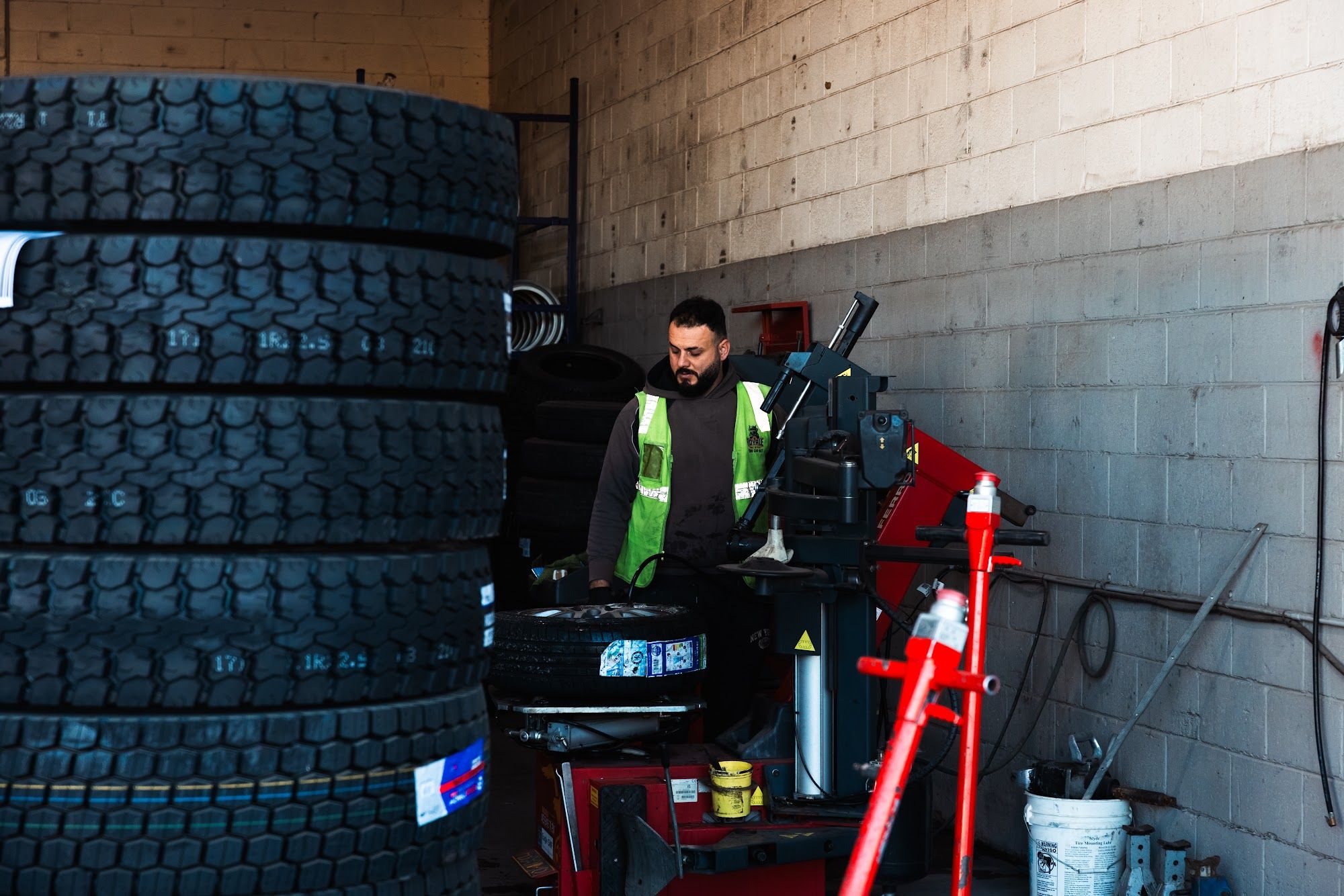 Royale technician fitting a car tyre at Cabramatta
