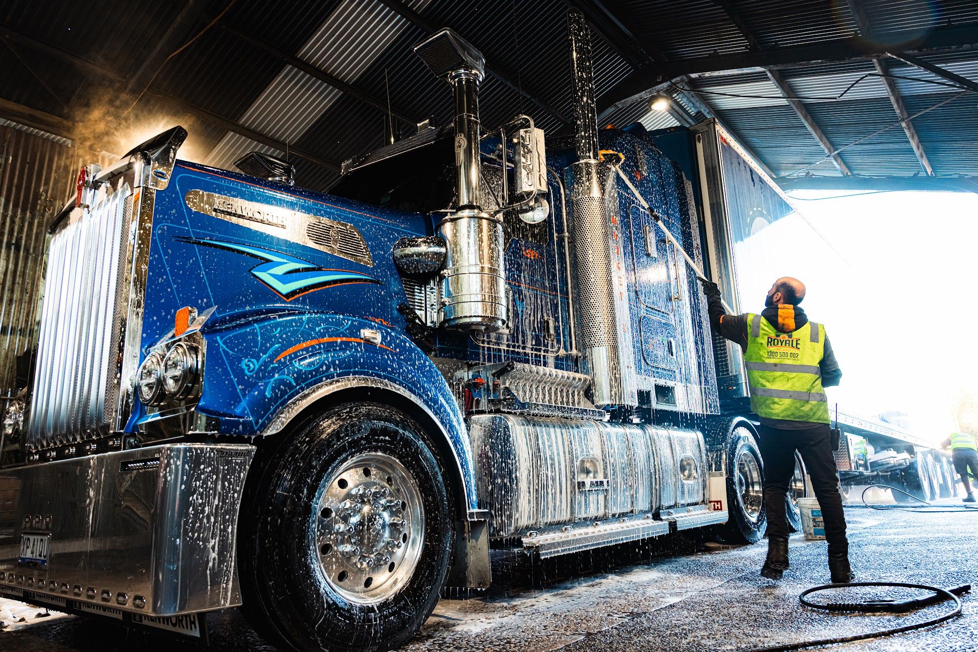 Royale team washing a truck